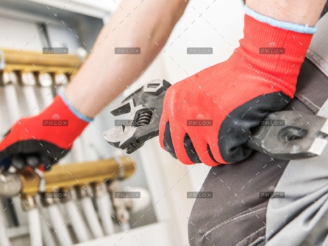 demo-attachment-137-op_technician-repairs-heating-JFGPBHA-scaled